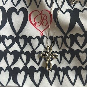 Brighton interlok petite cross necklace.